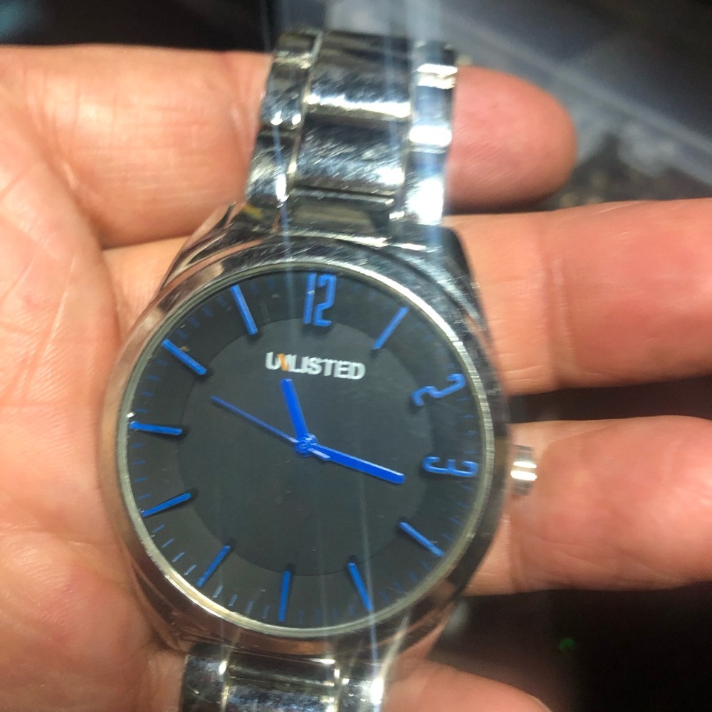 Unlisted Silver Watch with Black Dial and Blue Accents